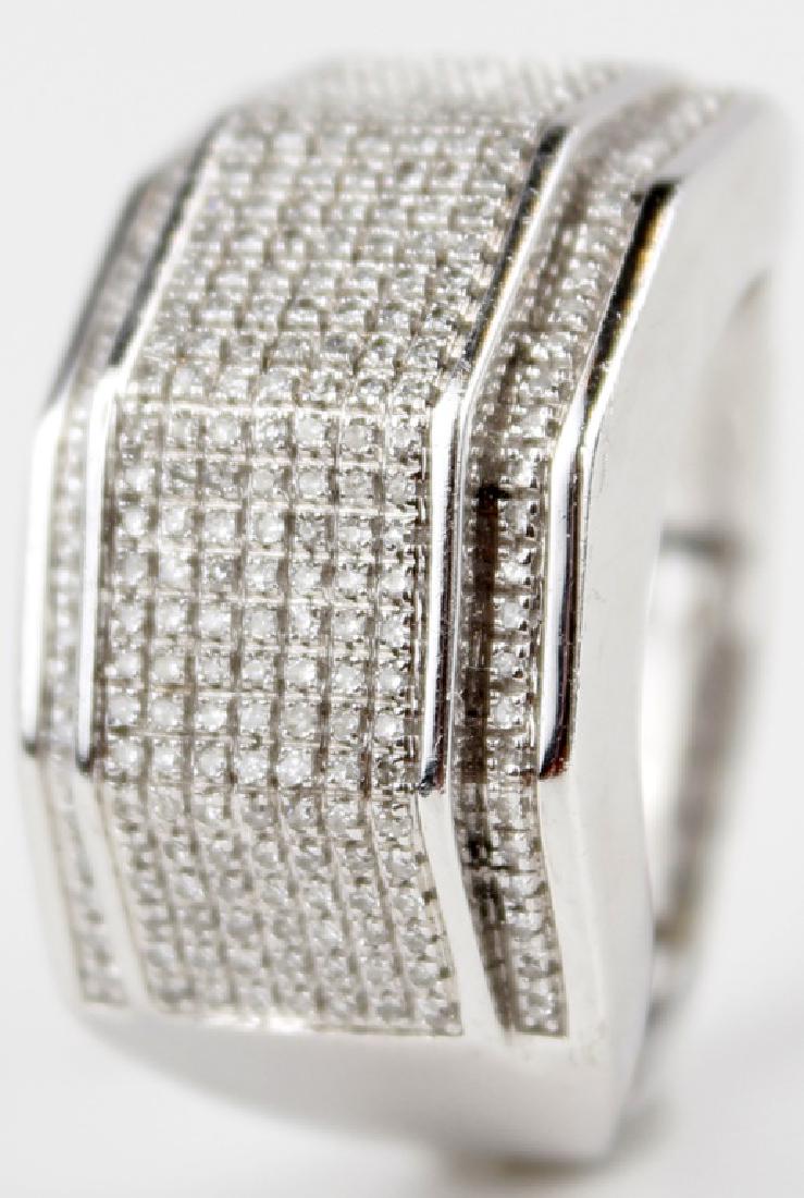 10K WHITE GOLD AND DIAMOND MENS CUSTOM RING: 10K WHITE GOLD AND DIAMOND MENS CUSTOM RING 10k white gold diamond custom men's ring. (234) micro pave round cut diamonds totaling 1.17CTTW. Stamped 10k Weight: 9.7 g Size: 10