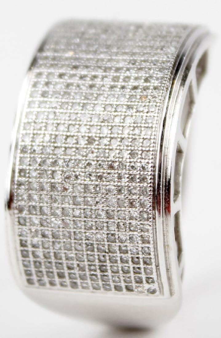 10K WHITE GOLD DIAMOND MENS DESIGNER RING: 10K WHITE GOLD DIAMOND MENS DESIGNER RING 10K white gold and diamond men's custom designer ring. (432) micro pave round diamonds 2.16CTTW. Stamped 10k. Weight: 7.6 g Size: 10
