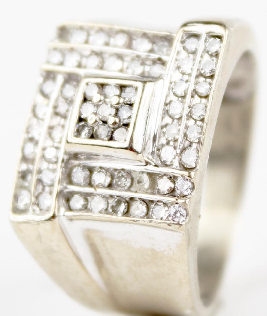 10K WHITE GOLD DIAMOND MENS CUSTOM FASHION RING: 10K WHITE GOLD DIAMOND MENS CUSTOM FASHION RING 10k white gold diamond custom men's fashion ring. Custom intricate pattern composed of (57) .01ct round diamonds. .57CTTW. Stamped 10k Weight: 5.6 g Siz