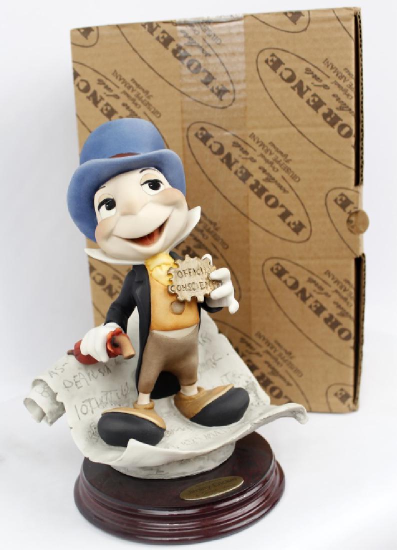 GIUSEPPE ARMANI'S DISNEY COLLECTION JIMINY CRICKET: GIUSEPPE ARMANI'S DISNEY COLLECTION JIMINY CRICKET Giuseppe Armani figurine collection "Jiminy Cricket". From Walt Disney's Pinocchio. Open edition Disney number 0379C. Made in Italy, 1995. Includes o