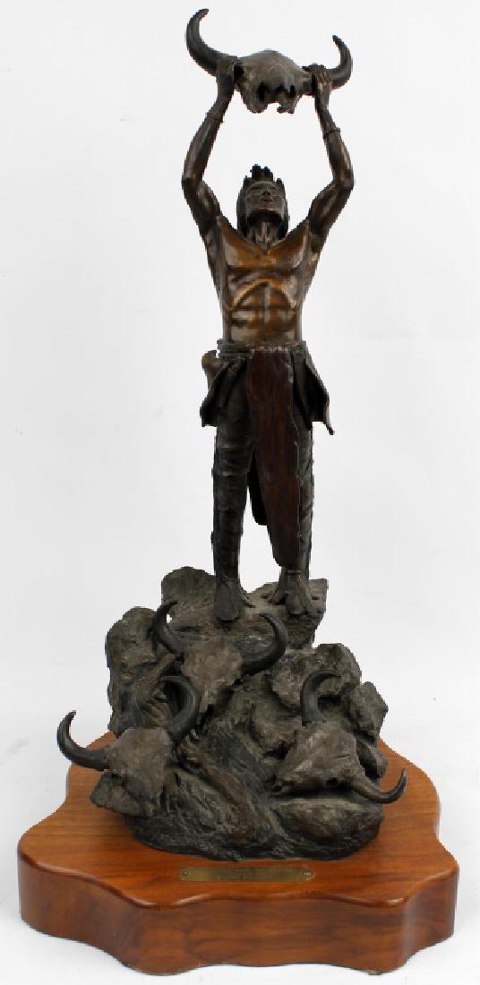 BRONZE NATIVE AMERICAN AFTER FREDERIC REMINGTON: BRONZE NATIVE AMERICAN AFTER FREDERIC REMINGTON Bronze native American statue recast after Frederick Remington by Roy Harris. Titled "Conjuring Back the Buffalo." Signed on front Roy Harris and on bac