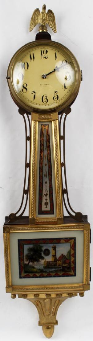 KILLAM AND CO LIGHTHOUSE BANJO CLOCK: KILLAM AND CO LIGHTHOUSE BANJO CLOCK Beautiful Killam & Co. Late 18th Century to early 19th Century banjo clock, including a brass perched eagle resting on the top of the clock. The face directly belo