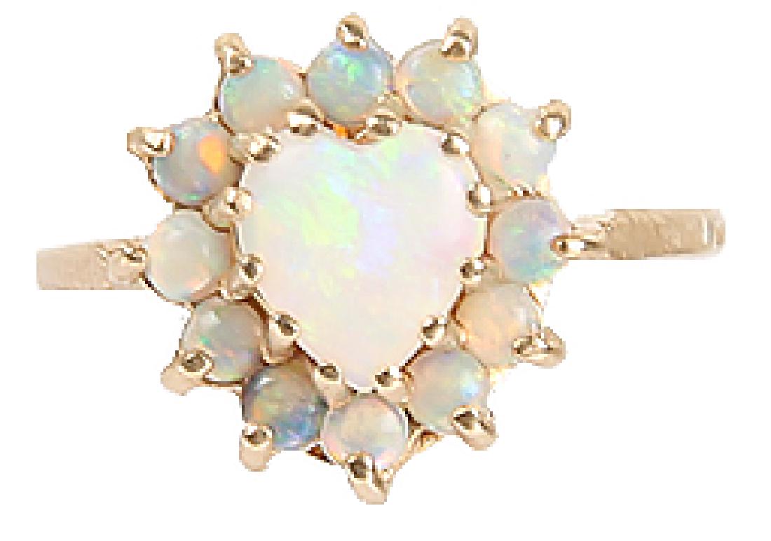 14K YELLOW GOLD ROMANY HEART SHAPED OPAL RING: 14K YELLOW GOLD ROMANY HEART SHAPED OPAL RING 14K yellow gold Romany Stern & Stern Co. heart-shaped genuine opal ring with 12 small opal stones surrounding a large heart shaped opal measuring 15mm acr