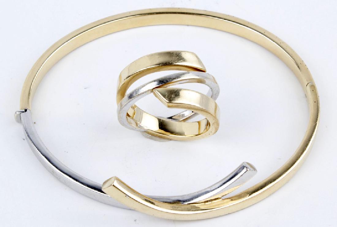 14K TWO TONE GOLD RING AND CUFF BRACELET SET: 14K TWO TONE GOLD RING AND CUFF BRACELET SET 14k yellow and white gold ring and cuff bracelet set. Ring is size 8 with modern line design, Bracelet fits a size 8" wrist. Both marked 14k. Weight: 14.0 