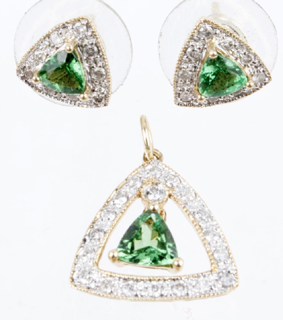 14K YELLOW GOLD TSAVORITE GARNET DIAMOND SET: 14K YELLOW GOLD TSAVORITE GARNET DIAMOND SET 14k yellow gold Tsavorite Garnet and diamond earring and pendant set. 6mm tsavorite garnets surrounded by diamonds. Weight: 3.6 g