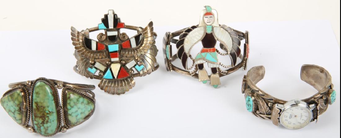 FOUR STERLING SIGNED CUFF BRACELETS & WATCHBAND: FOUR STERLING SIGNED CUFF BRACELETS & WATCHBAND Four sterling silver signed pieces, includes: turquoise cuff signed BJ, coral and turquoise watchband cuff signed EJ, Zuni Eagle Dancer cuff signed L&V 