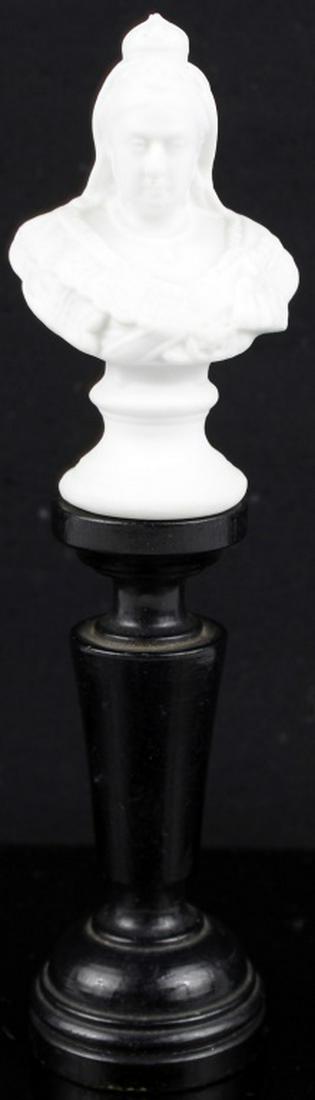 R. BELT SCULPTOR QUEEN VICTORIA GERMAN PARIAN BUST: R. BELT SCULPTOR QUEEN VICTORIA GERMAN PARIAN BUST A small, attractive Parian Ware bust of the Queen mounted on a turned hardwood socle. Fine detail for size. The rear stamped “R. Belt Sculptor 1897
