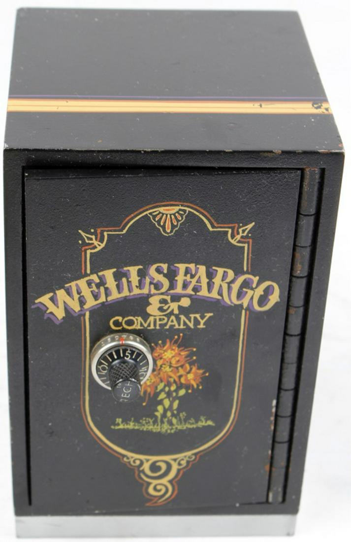 PAINTED WELLS FARGO STYLE MINIATURE SAFE: PAINTED WELLS FARGO STYLE MINIATURE SAFE A vintage, small, heavy (12 lbs) metal combination Wells Fargo safe. Interior lined with wood. Combination lock in good working order and condition (combinatio