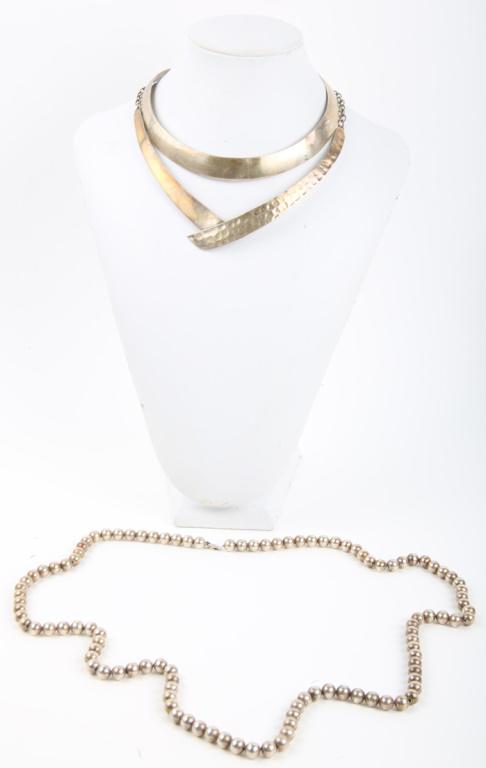 THREE STERLING SILVER FASHION NECKLACES: THREE STERLING SILVER FASHION NECKLACES Three sterling silver fashion necklaces, includes: sterling beaded (32"), hammer finish (16"), and choker (13" with 1.5" opening). Weight: 123.1g