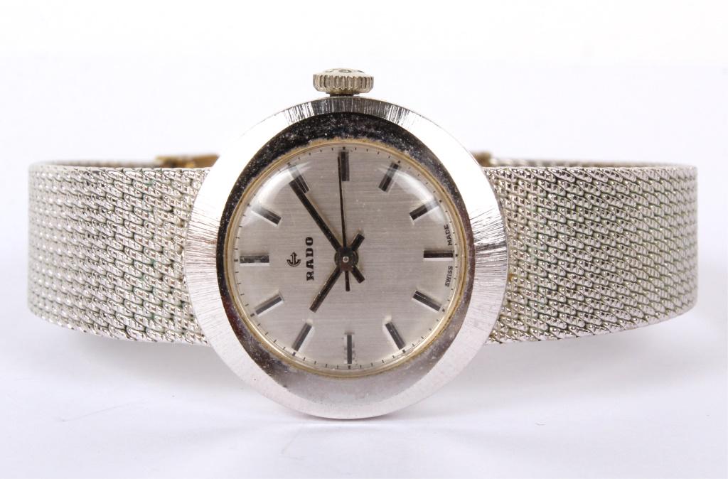 LADIES RADO STEEL MESH WRIST WATCH 7032 MANUAL: LADIES RADO STEEL MESH WRIST WATCH 7032 MANUAL Ladies steel mesh bracelet and case Swiss Rado wristwatch. Silver dial with onyx indices numerals. Weight: 27.0 grams Size: 24mm