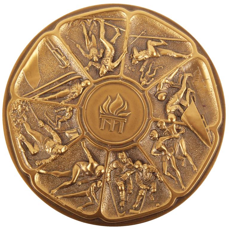 OLYMPIC AUTHORITY LAKE PLACID SOLID BRONZE MEDAL: OLYMPIC AUTHORITY LAKE PLACID SOLID BRONZE MEDAL 1985 Olympic Authority Lake Placid Winter Games solid bronze medal made by Medallic Art Co. in Danbury, CT. Weight: 235.4 Grams Condition: Very fine