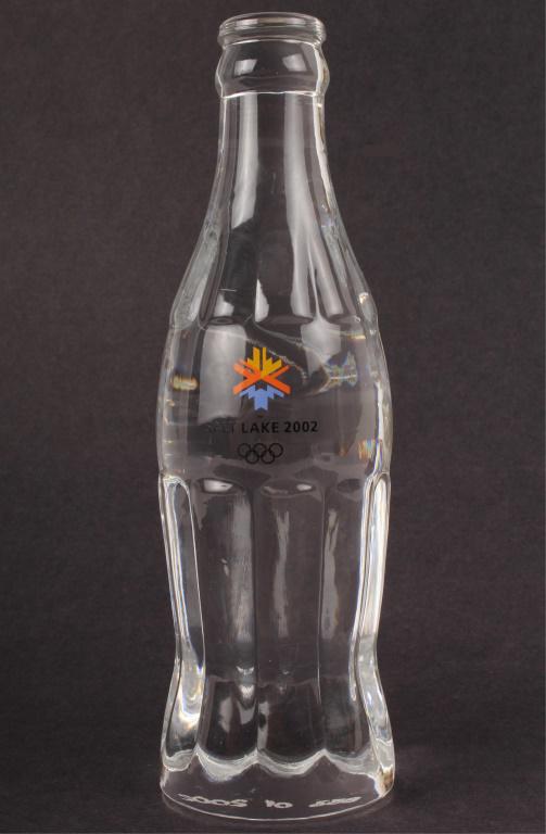 COCA-COLA 2002 SALT LAKE OLYMPICS CRYSTAL BOTTLE: COCA-COLA 2002 SALT LAKE OLYMPICS CRYSTAL BOTTLE Coca-Cola 2002 Salt Lake Olympics limited edition solid lead crystal bottle. Limited to only 2,002 bottles. marked on underside No# 653/2002 Size: 7.75