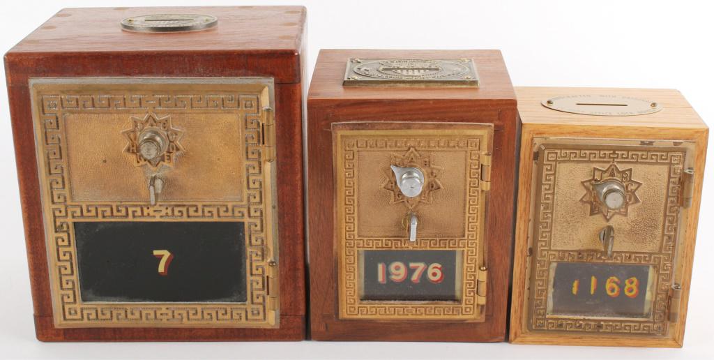 ORIGINAL U.S. POST OFFICE LOCK BOX DOOR BANKS - 3: ORIGINAL U.S. POST OFFICE LOCK BOX DOOR BANKS - 3 Original U.S. post office lock box door banks - lot of 3. Two of the lock boxes have the combinations attached to the underside. Made in the late 1950