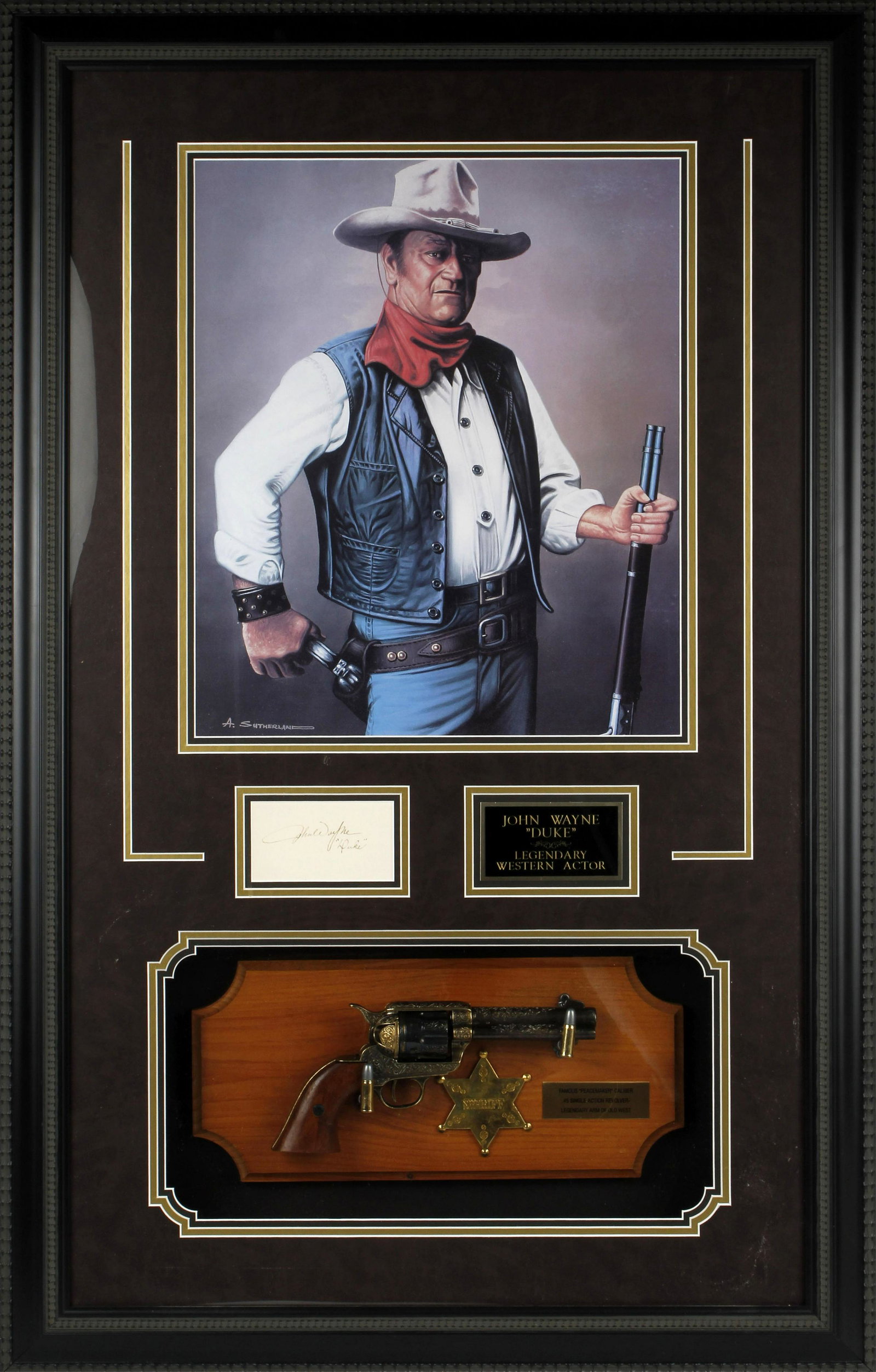 JOHN WAYNE DUKE LEGENDARY WESTERN ACTOR DISPLAY: John Wayne Duke, western actor, portrait and famous Peacemaker revolver. Framed in Shadow box, 28x 45" Condition: Very Fine.