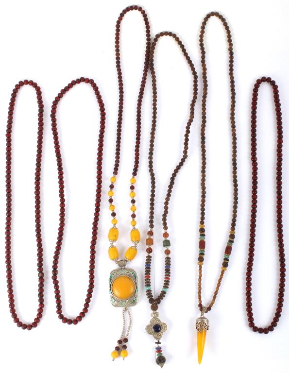 CHINESE WOOD BEAD NECKLACES BAKELITE- LOT OF 6: CHINESE WOOD BEAD NECKLACES BAKELITE- LOT OF 6 Chinese carved wood bead necklaces - lot of 6. Three bracelets have Bakelite pendants and three do not. Size: 32" longest Condition: Fine