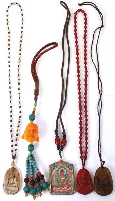 CHINESE PENDANT NECKLACES BAKELITE - LOT OF 4: CHINESE PENDANT NECKLACES BAKELITE - LOT OF 4 Chinese beaded pendant necklaces - lot of 4. One of the necklaces has a carved Bakelite pendant. Size: Varied Condition: Very fine