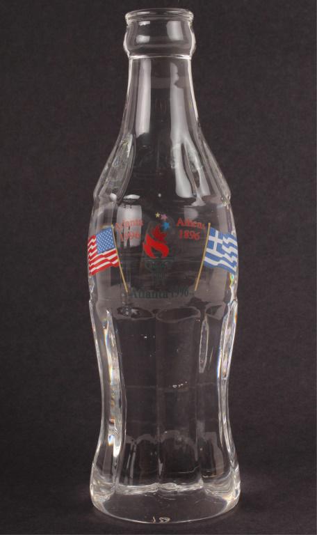 COCA-COLA 1996 OLYMPICS SOLID CRYSTAL BOTTLE: COCA-COLA 1996 OLYMPICS SOLID CRYSTAL BOTTLE Coca-Cola State Centennial 1896-1996 Atlanta Olympics limited edition solid lead crystal bottle. Limited to only 1,996 bottles. No# 1923/1996 marked on und