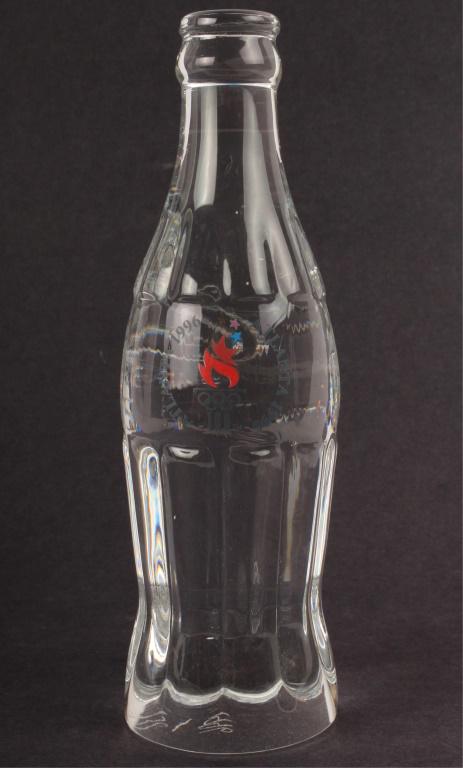 COCA-COLA 1996 OLYMPICS LTD. SOLID CRYSTAL BOTTLE: COCA-COLA 1996 OLYMPICS LTD. SOLID CRYSTAL BOTTLE Coca-Cola 1996 Atlanta Olympics limited edition solid lead crystal bottle. Limited to only 1,996 bottles. Marked 738/1996 on the underside. Size: 7.5"