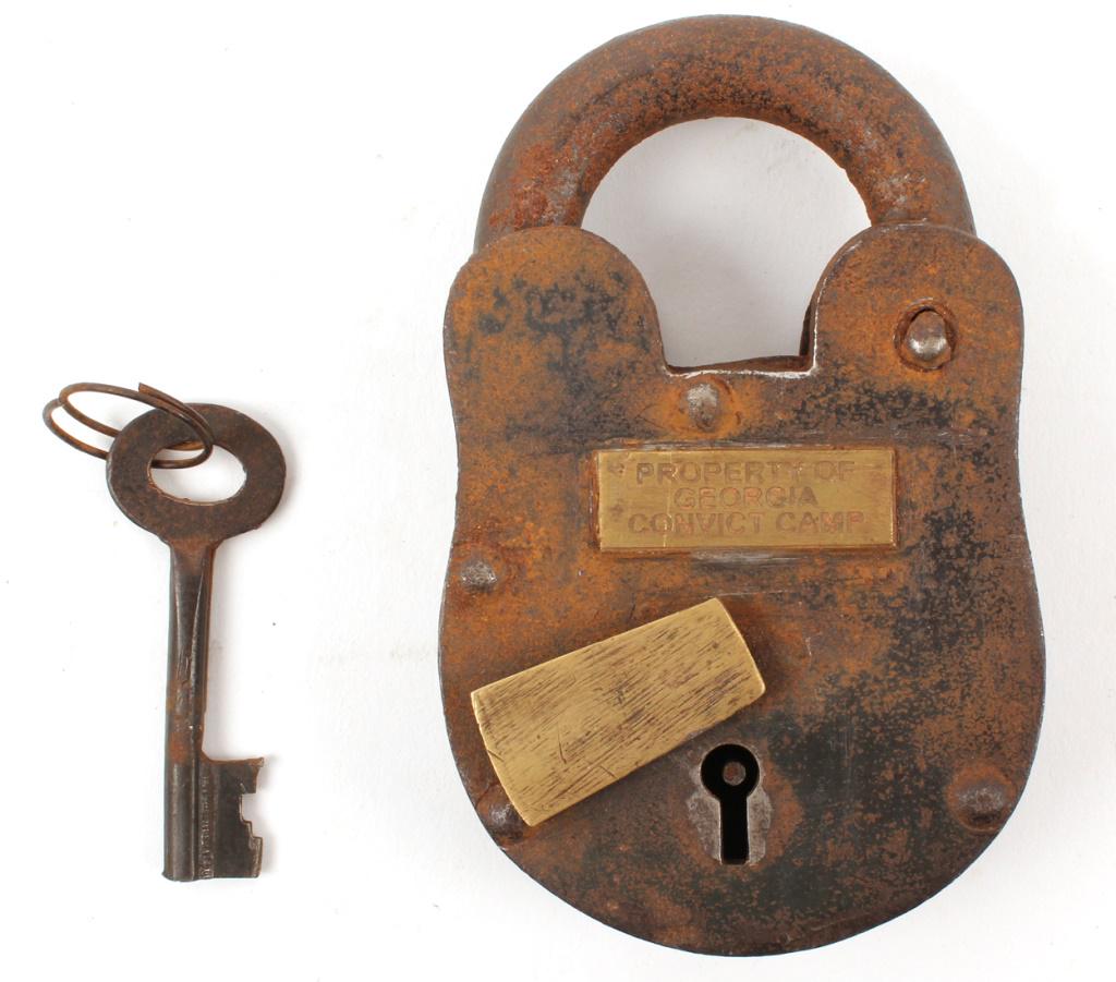 PROPERTY OF GEORGIA CONVICT CAMP LOCK & KEY: PROPERTY OF GEORGIA CONVICT CAMP LOCK & KEY Iron lock and key with brass plaque marked "Property of Georgia Convict Camp". Size: 4.75" Condition: Working order.