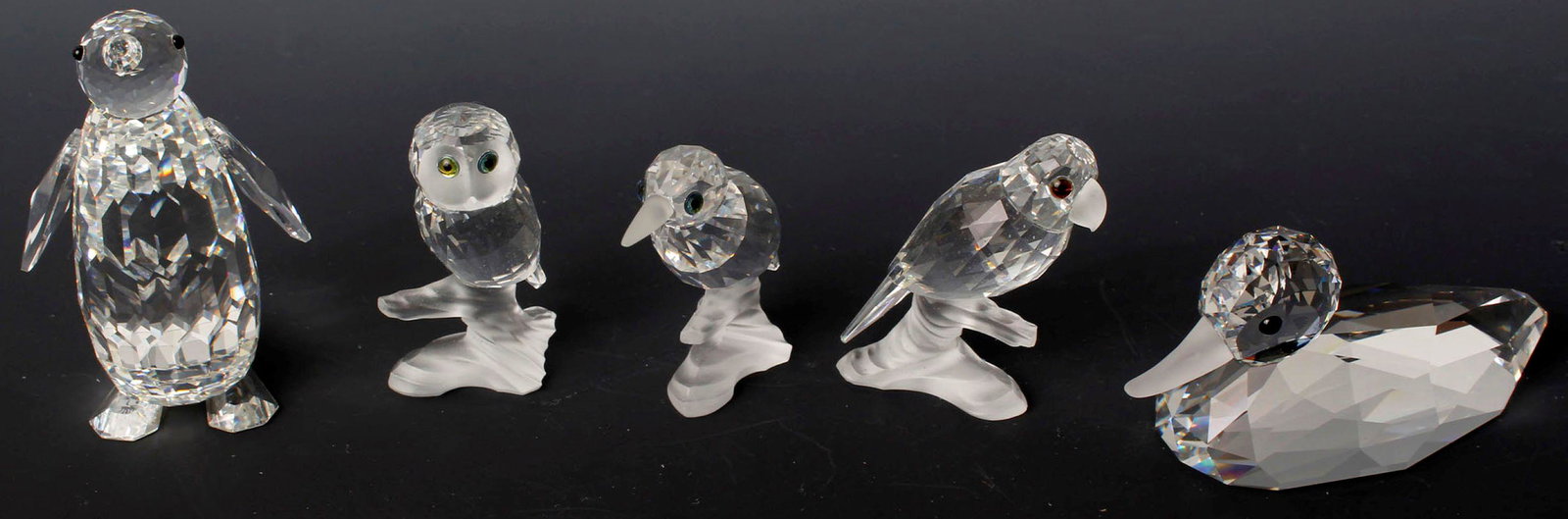 SWAROVSKI SILVER CRYSTAL - LOT OF 5: Swarovski Silver Crystal collection Animal figurines lot of 5 to include: #7621 Crow, #7621 Owl, #7621 Parrot, #7643 Penguin, #7647 Mallard. Size: 2" to 3" Condition: Very Fine.