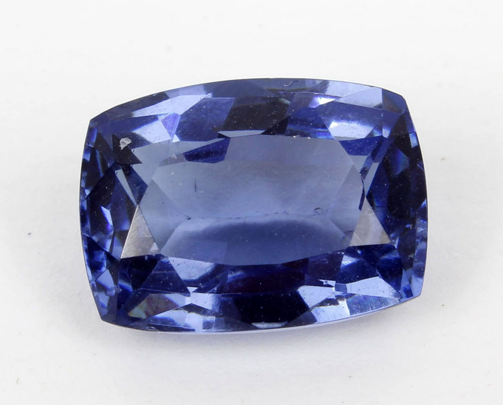 NATURAL TANZANITE CUSHION CUT 9.25CT: Natural Tanzantine Color: Blue Weight: 9.25ct Shape: Cushion Measures: 13.24 x 9.74 x 6.45