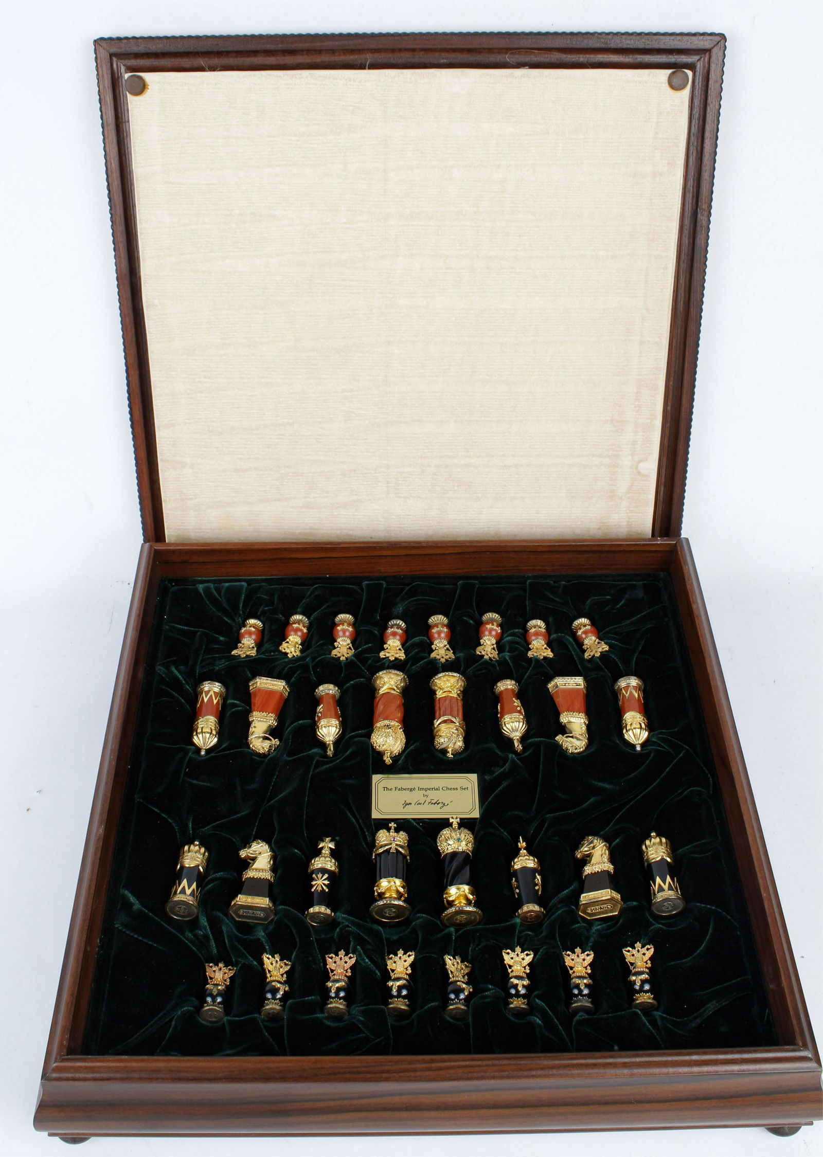 FABERGE IMPERIAL GOLD PLATED STERLING CHESS SET: A Faberge Imperial Chess Set by Igor Carl Faberge. 20th century. Mahogany box cover with inset marble game board. Velvet lined interior, fitted for storage of silver gilt mounted and hardstone chess p