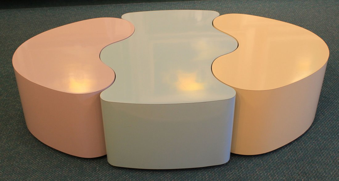 INTERLOCKING FORMICA COFFEE AND END TABLES: Mid century modern interlocking coffee and end tables. Extremely versatile set of tables that can be positioned in various ways to create a new look whenever needed. 3 piece pastel colored Formica - m