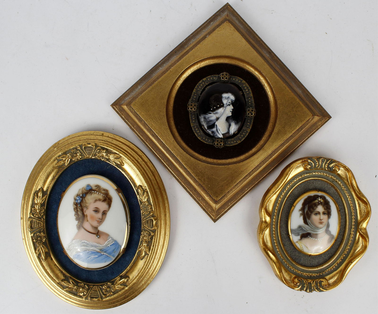LOT OF 3 KPM STYLE MINIATURE PORCELAIN PORTRAITS: Lot of three KPM style miniature porcelain portraits, to include: (1) Oval Lady in blue measuring 3.5" x 2.5" and 6.5" x 5.5" framed, (1) Oval Lady in a scarf, measuring 2.5" x 1.75" and 5" x 4" frame