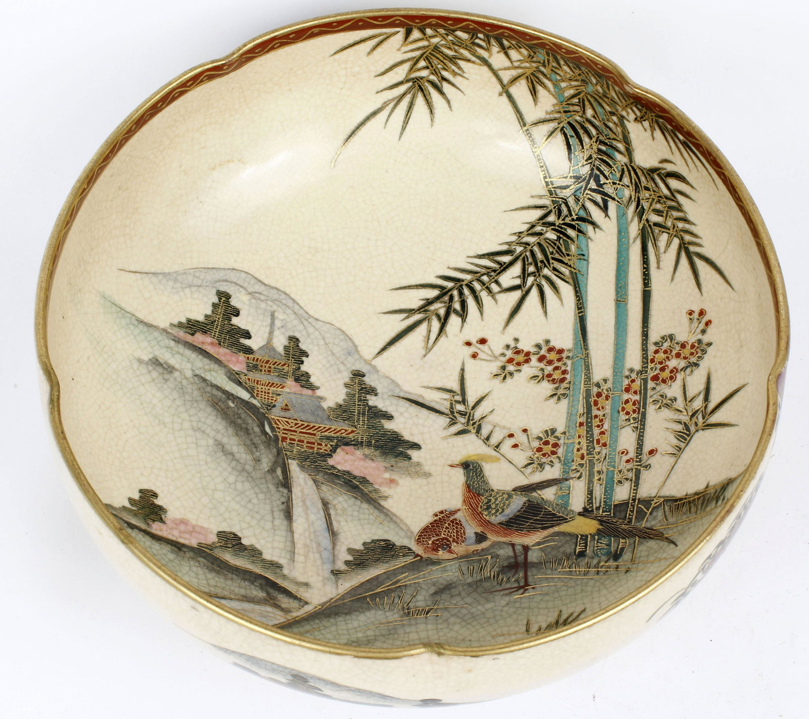 SATSUMA MEIJI BOWL GILT WISTERIA LANDSCAPE: Satsuma bowl Meiji period (1867-1912). Ivory bodied piece with vintage high quality finely crackled transparent glaze. Hand painted landscape with birds in the foreground. Wisteria vines on outside of