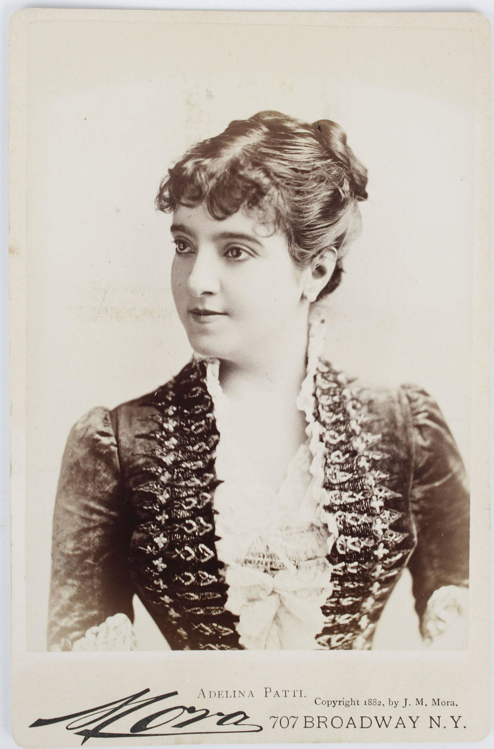 ADELINA PATTI OPERA SINGER "MORA" CABINET CARD: Adelina Patti (1843-1919) was an Italian 19th-century opera singer, earning huge fees at the height of her career in the music capitals of Europe and America. She first sang in public as a child in 18
