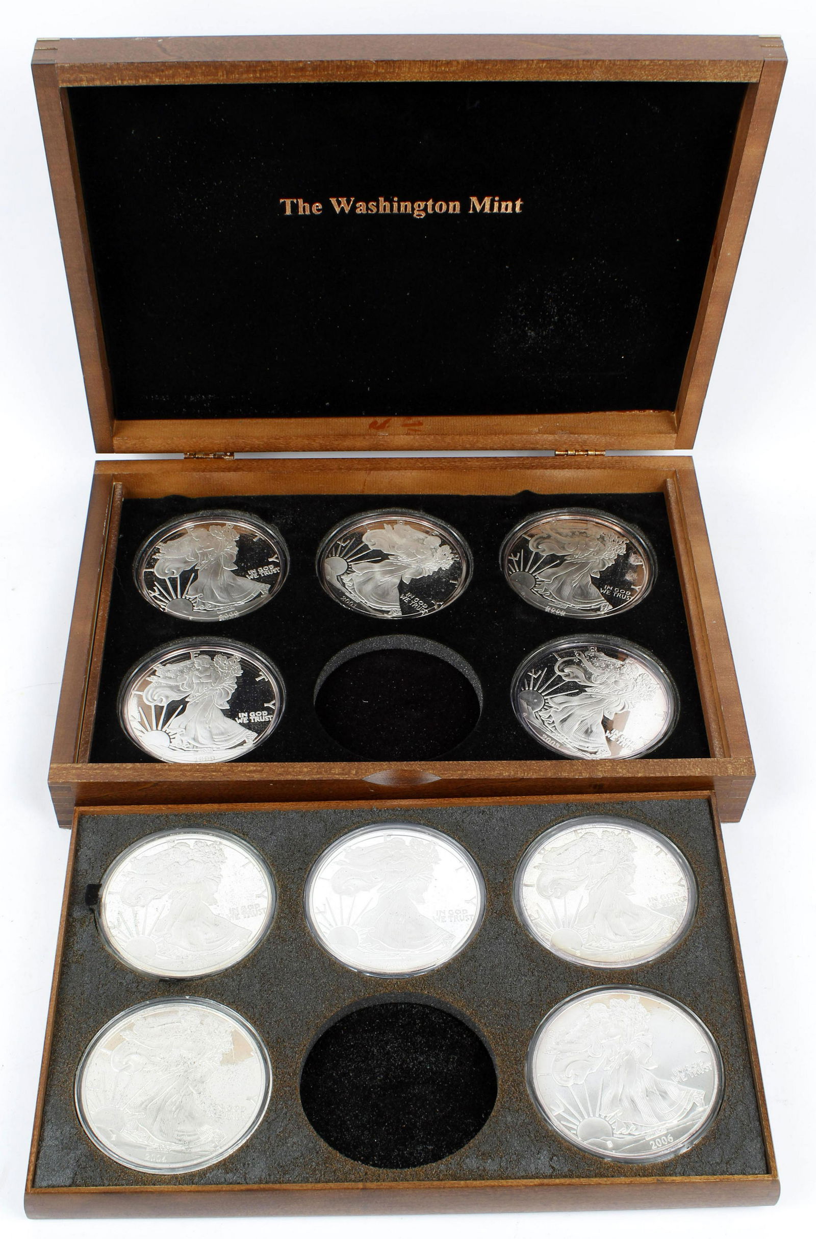 .999 SILVER WASHINGTON MINT SET: 10 .999 pure silver half pound rounds(8 troy ounces) proof liberty rounds in original presentation box.