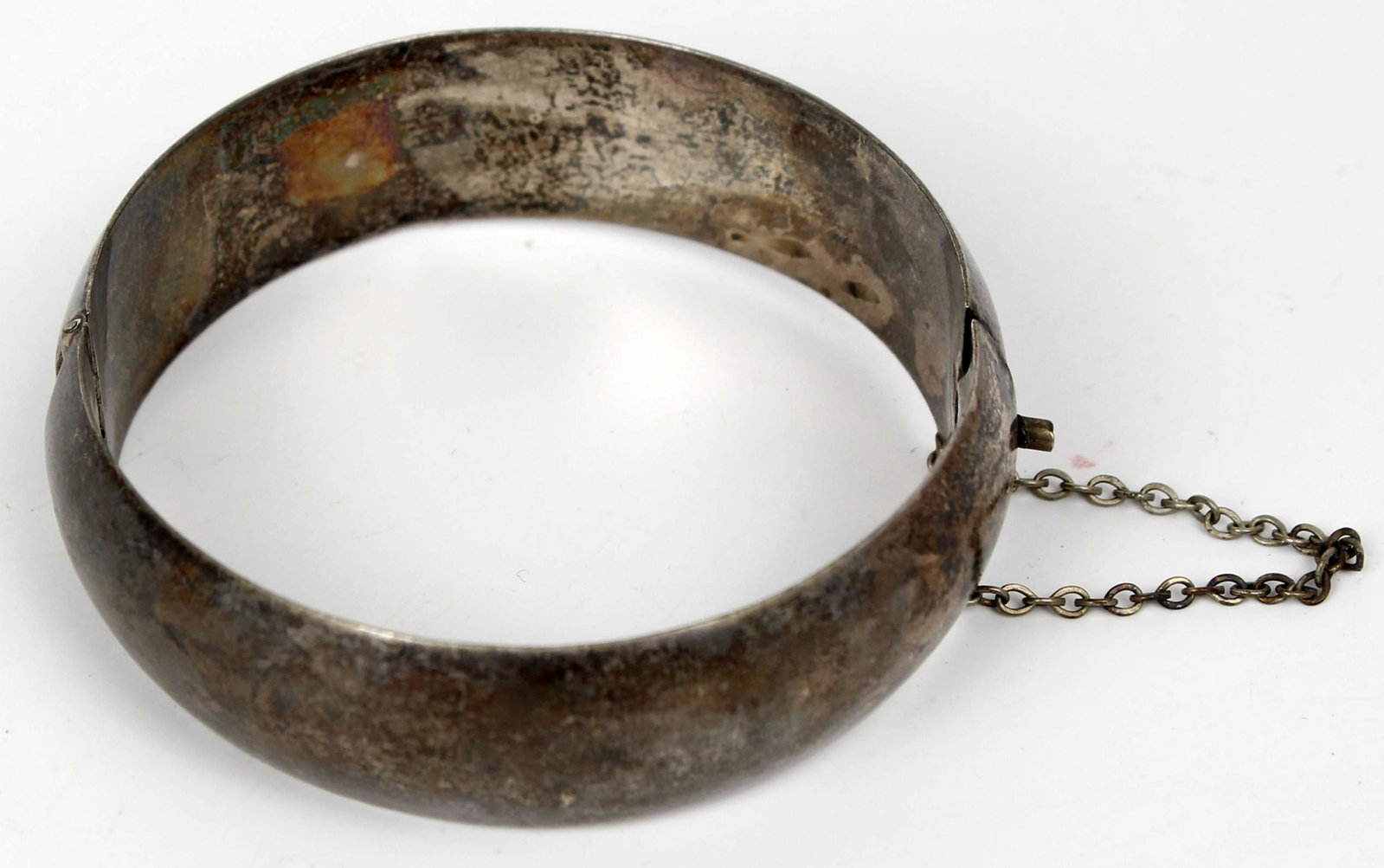 VINTAGE STERLING BANGLE CLASP CHAIN: Vintage hollow sterling bangle with clasp and chain. Weight: 19.6 grams Condition: Very Fine