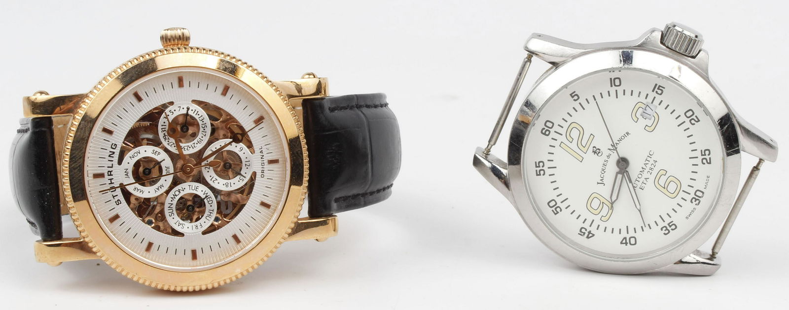 LOT OF 2 - MEN'S WATCHES STUHRLING, JACQUES MANOIR: Lot of 2 Men's wrist watches. (1) Stuhrling rose gold tone automatic 20 jewel, sapphire crystal,black leather strap. (1) Jacques Du Manoir automatic 25 jewels, sapphire crystal, no strap. Both needrep