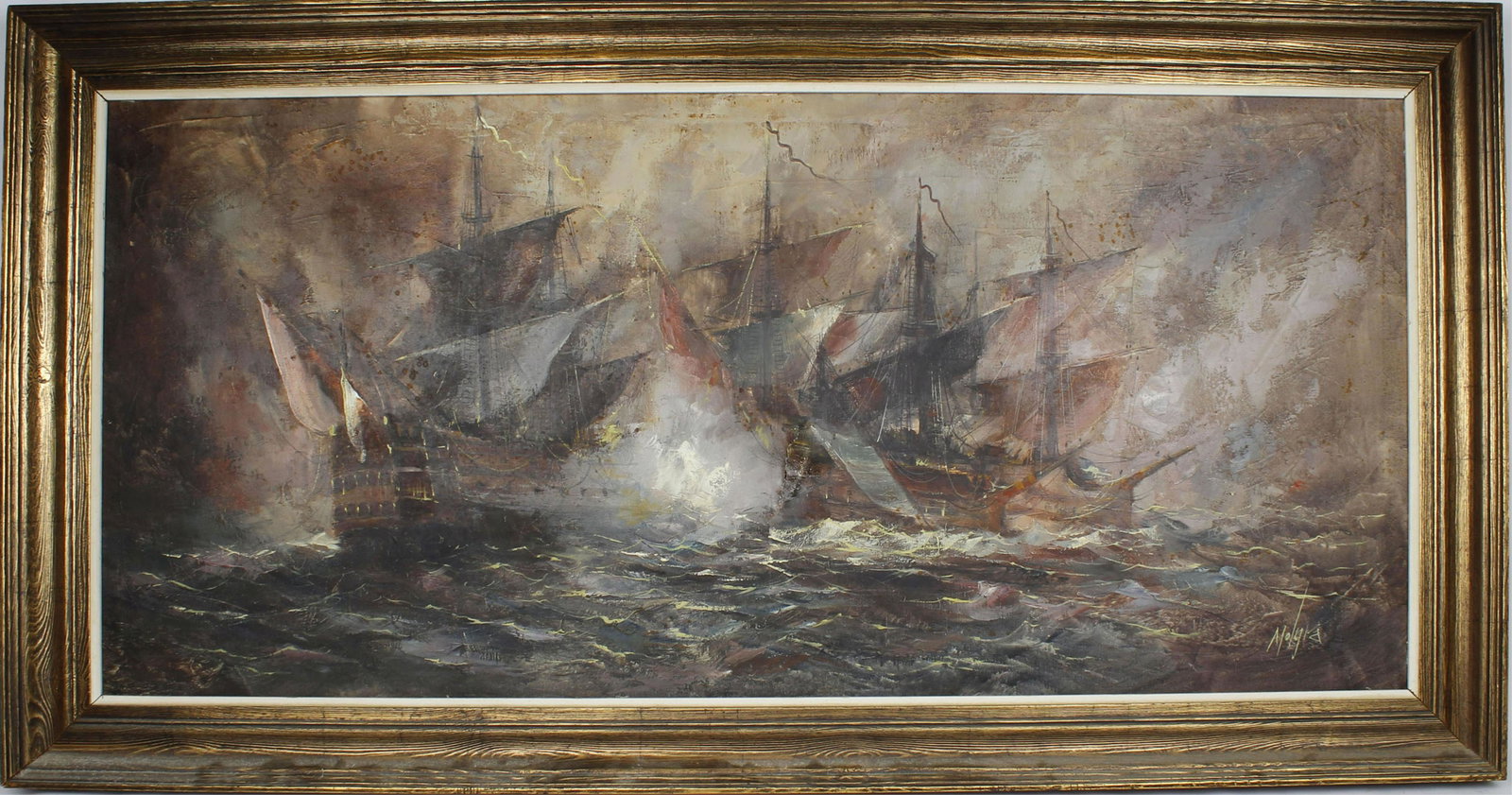 BATTLE AT SEA PAINTING MOGLIA: Dark turbulent waters thrust the ships back and forth as they attempt battle at sea. Oil on Stretched canvas. Damage(tear) to center of painting. Large ornate frame. Signed lower right corner. 51x24 c