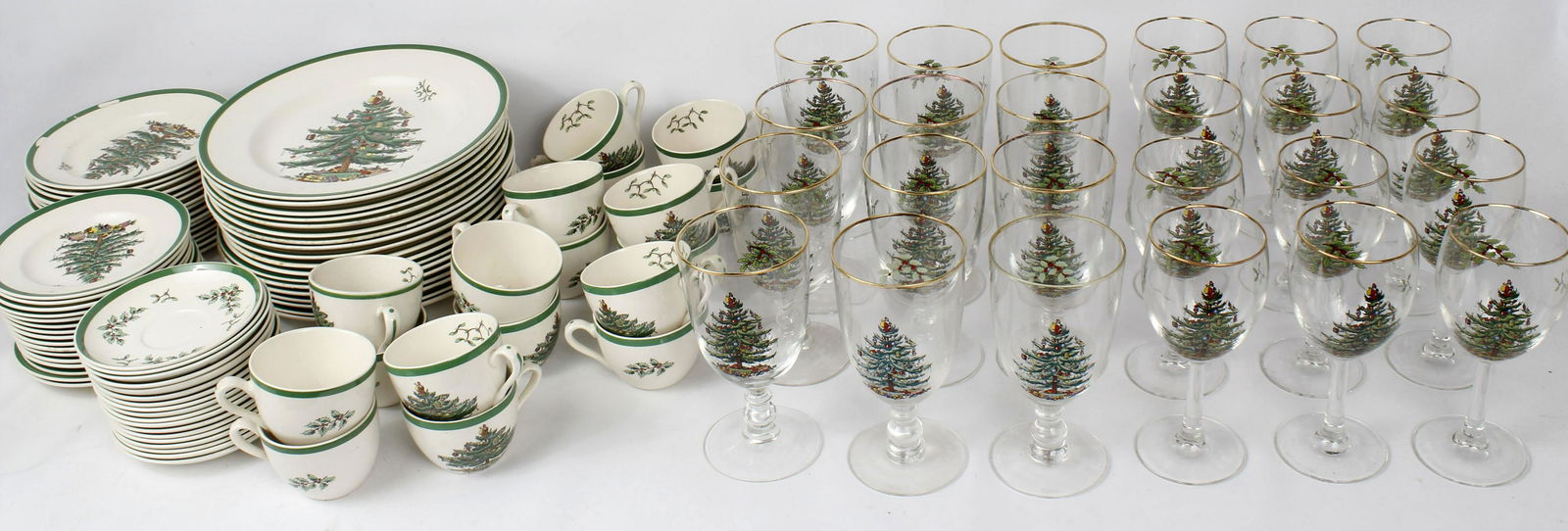 LOT OF CHRISTMAS DINNERWARE FOR 12 SPODE CHINA: Christmas patterned dinnerware set to include: (12) Dinner Plates, (12) Salad Plates (chipping to the green enamel, (12) Desert Plates, (12) saucers, (12) teacups, (12) Spode glass goblets, (12) Spode