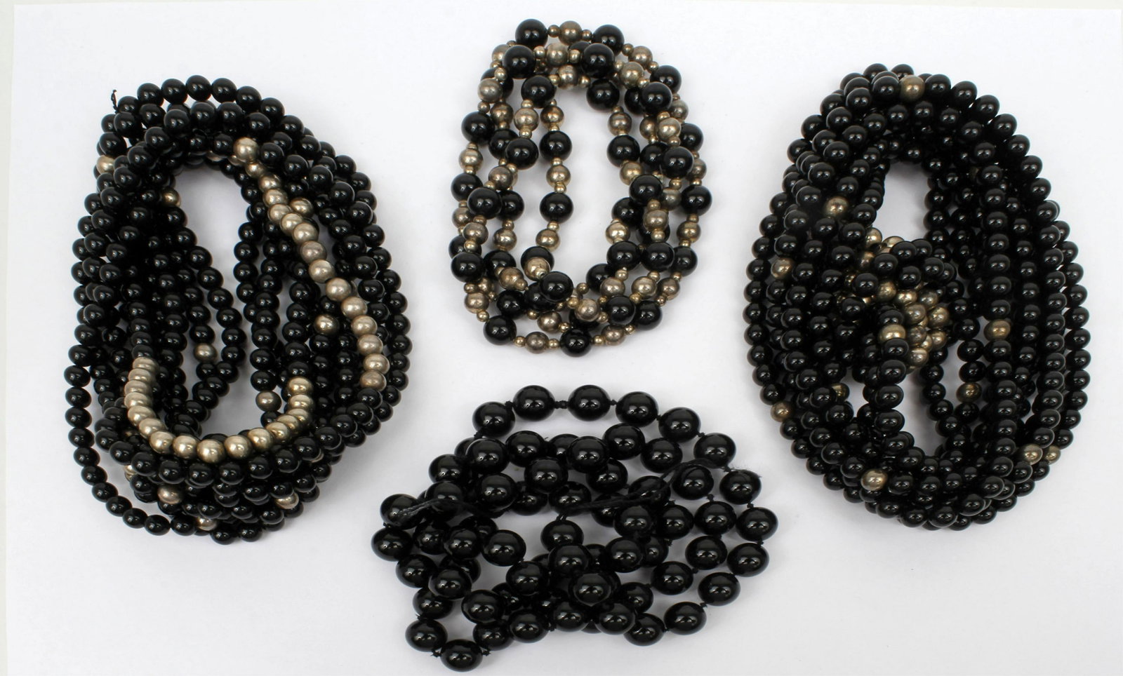 ONYX BEADED NECKLACES AND BRACELETS: Lot of 4 necklaces - One needs to be re-strung(loose beads included). Condition: Fine