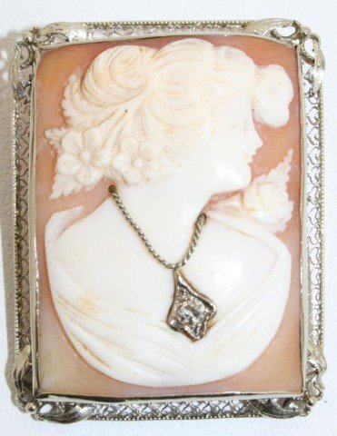 14K GOLD FILIGREE DIAMOND CAMEO BROOCH / PENDANT: 14K GOLD FILIGREE DIAMOND CAMEO BROOCH / PENDANT 14k Filigree Diamond Cameo Broach / Pendant. Magnificently hand carved Italian cameo silhouetted on a blush pink shell, set in finely laced 14k white g