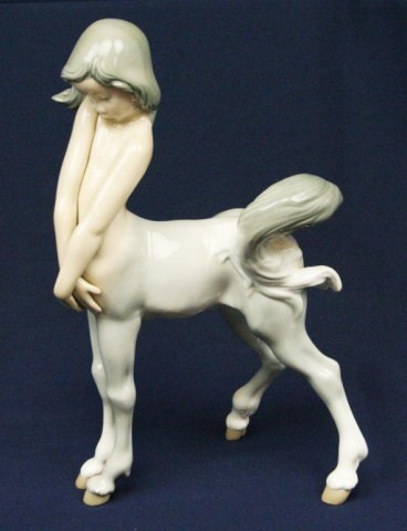 RETIRED LLADRO PORCELAIN FIGURE #1012 CENTAUR GIRL: RETIRED LLADRO PORCELAIN FIGURE #1012 CENTAUR GIRL 01001012 CENTAUR GIRL Issue Year: 1970 Retirement Year: 1990 Sculptor: Fulgencio Garc¡a. No damage. Size: 9.5" Condition: VGC EST. $200-300