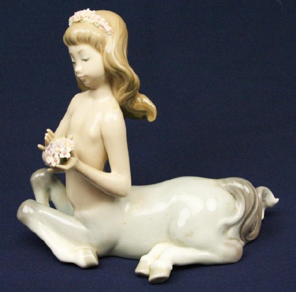 RETIRED LLADRO PORCELAIN FIGURE #5319: RETIRED LLADRO PORCELAIN FIGURE #5319 01005319 WISTFUL CENTAUR GIRL Issue Year: 1985 Retirement Year: 1990 Sculptor: Jos‚ Puche. No damage. Size: 5.5" Condition: VGC EST. $100-300