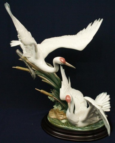 LLADRO PORCELAIN FIGURE #1456 CRANES W/ BASE: LLADRO PORCELAIN FIGURE #1456 CRANES W/ BASE 01001456 CRANES Issue Year: 1983 Sculptor: Salvador Deb¢n. With wooden base. No damage. Size: 21.25" Condition: VGC EST. $600-1000
