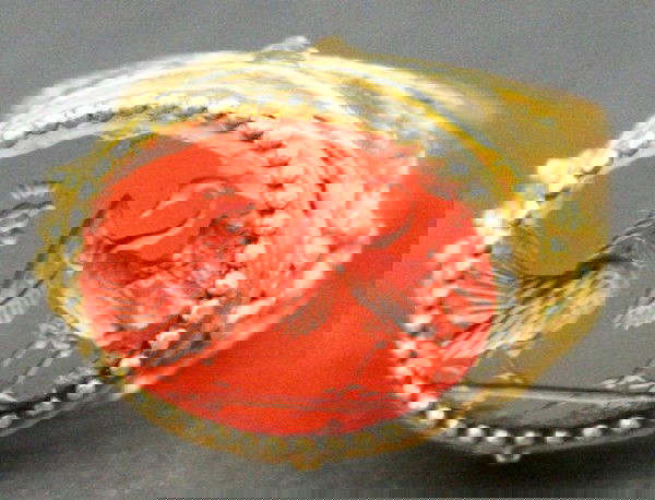 24K GOLD RING W/ ANCIENT EGYPTIAN INTAGLIO SIGNET: 24K GOLD RING W/ ANCIENT EGYPTIAN INTAGLIO SIGNET Rooster and Crane design, presumably a wedding signet. 3rd century B.C. Coupled in a contemporary casting designed to fit the period of the signet. 18