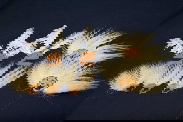 ALASKAN ESKIMO CEREMONIAL DANCE FANS: ALASKAN ESKIMO CEREMONIAL DANCE FANS A small lot of dance fans made from polar bear fur and skin and feathers and wood. Size: NA Condition: VGC EST. $300-500