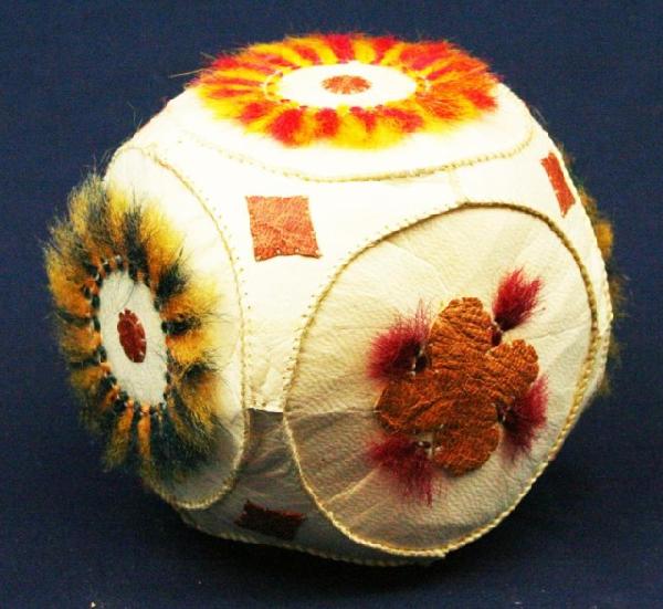 ALASKAN ESKIMO SEAL SKIN GAME BALL: ALASKAN ESKIMO SEAL SKIN GAME BALL A vintage, hand made, colored game ball of seal skin. Size: 3.5" Condition: VGC EST. $100-300