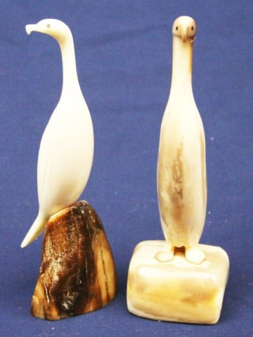 ALASKAN ESKIMO WALRUS TUSK IVORY CARVED BIRDS: ALASKAN ESKIMO WALRUS TUSK IVORY CARVED BIRDS A pair of walrus ivory carved birds. One is signed. Size: 5.5" Condition: VGC EST. $100-300