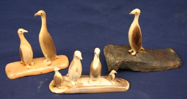 ALASKAN WALRUS TUSK IVORY BIRDS: ALASKAN WALRUS TUSK IVORY BIRDS Small lot of carved ivory birds. Signed by the artist. One is mounted to bone. Size: 3.5" to 4.5" tall. Condition: VGC EST. $150-300