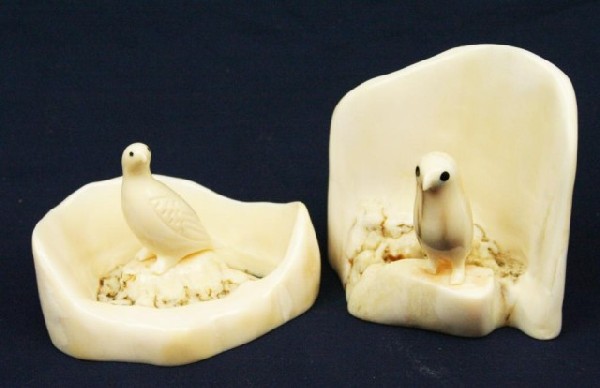 ALASKAN WALRUS TUSK IVORY BIRDS: ALASKAN WALRUS TUSK IVORY BIRDS Two birds carved from walrus tusk ivory and both signed "Antogname". Size: up to 2.5" Condition: VGC EST. $150-300