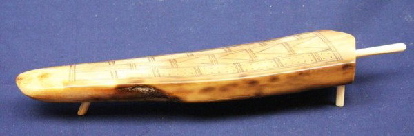 WALRUS TUSK ALASKAN IVORY CRIBBAGE BOARD: WALRUS TUSK ALASKAN IVORY CRIBBAGE BOARD Walrus tusk cribbage board. Signed "M.C." No peg pieces. Size: 8" Condition: VGC EST. $200-400