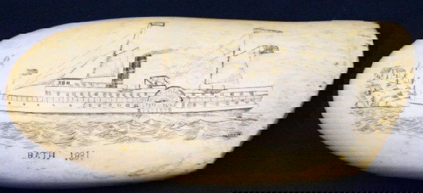 RARE MAP STATE OF MAINE WHALE TOOTH SCRIMSHAW: RARE MAP STATE OF MAINE WHALE TOOTH SCRIMSHAW Very well executed scrimshaw whale tooth showing a map of Maine to one side and a paddle steamer to the other. ?BATH 1881? inscribed below. Size: 8.5" Con