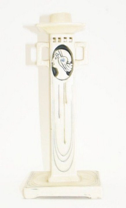 WELLER CREAMWARE POTTERY CANDLESTICK: WELLER CREAMWARE POTTERY CANDLESTICK Art Nouveau style candlestick standing 11.25 inches. VGC. Size: 11.25 Condition: VGC Est. 100-200