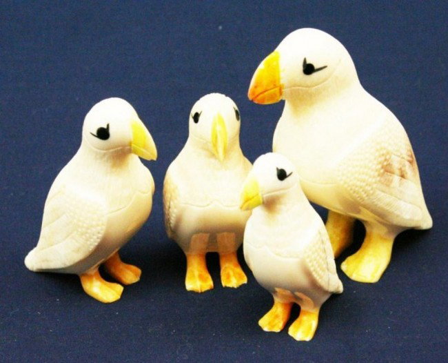 ALASKAN WALRUS TUSK IVORY CARVED BIRDS: ALASKAN WALRUS TUSK IVORY CARVED BIRDS Lot of 4 walrus ivory birds. Size: 2.25" x 3" Condition: VGC Est. 150-300